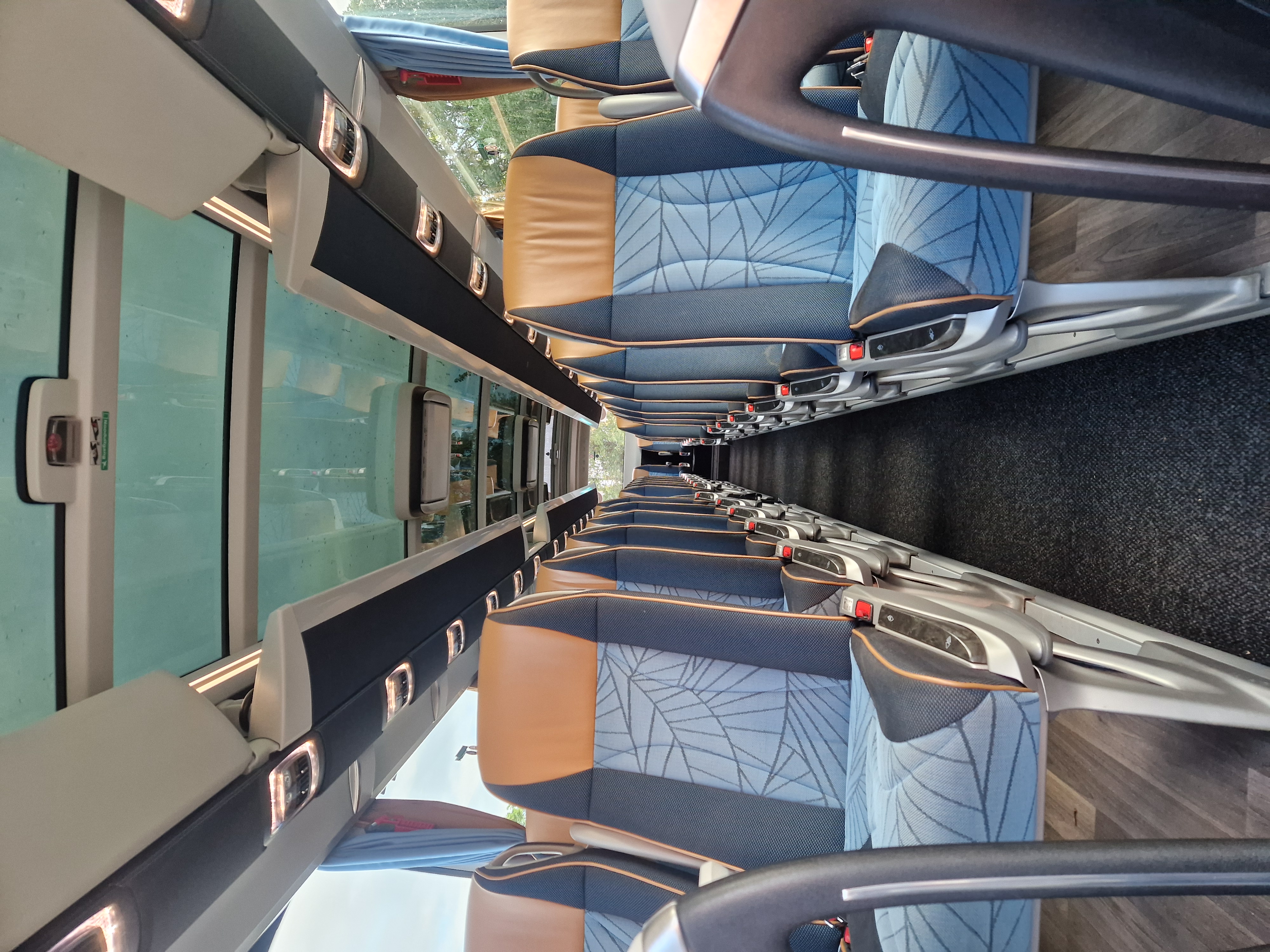 Inside of a Setra bus, viewed from the front of the bus