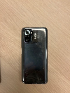 Picture of the back of a black POCO phone